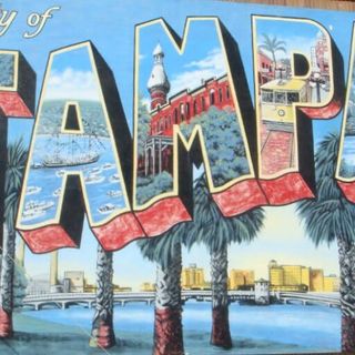 Mural in style of vintage postcard with each letter of word Tampa having different images.