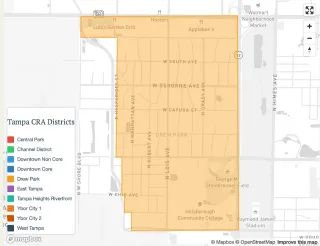 A grey-scale map of the Drew Park CRA district with the district shaded tannish orange. The area is generally west of Dale Mabry, south of Hillsborough Ave and north of Tampa Bay Blvd with the airport to the west.