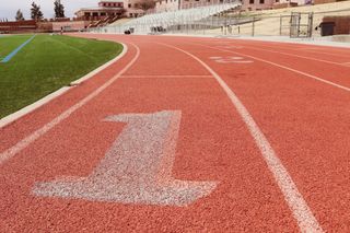 The number 1 marking the first lane of a running track.